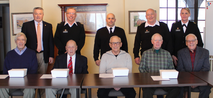 BACK ROW L-R: Rob Bollinger, Master Sergeant Ken Peloski (Retired), Colonel Joseph Scrocca (Retired), Sergeant Major David Berrisford ‘81 (Retired), Sergeant First Class Brittany Thingvold (Retired) FRONT ROW L-R: Terry Cummings '58, Commandant Colonel John (“Jack”) Hougen, Dr. Pat Mascia '59, Mike Murphy '57, Dr. Bob Christensen '58