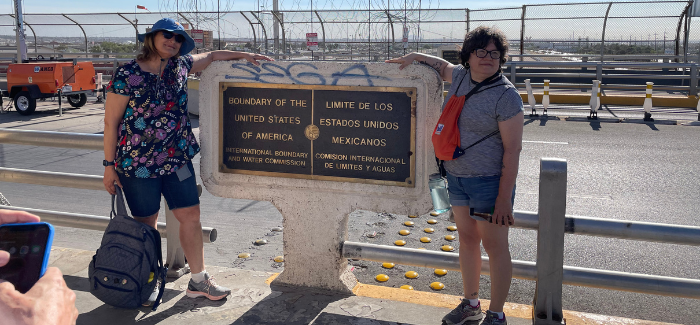 Jenny Markert and Christina DeVos crossing one of the bridges over the Rio Grande River at the US-Mexico border