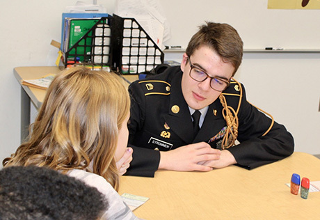 JROTC Members Teach Junior Achievement Program to Elementary Students