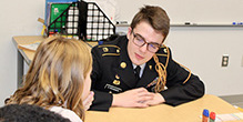 JROTC Members Teach Junior Achievement Program to Elementary Students