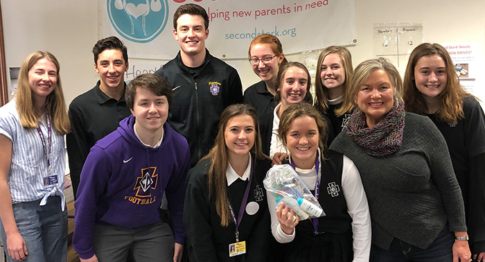 Members of the Respect Life Team volunteered at the Second Stork. Members are pictured with co-founder Deb O'Halloran'76, second from right.