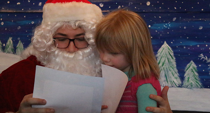 Santa and a Community of Saints student share a very special letter.
