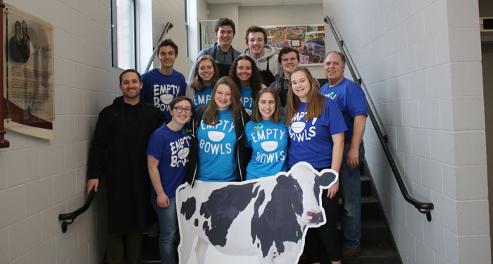 Members of the Empty Bowls team with their faculty leaders, Joe Miley and Peter Gleich. 