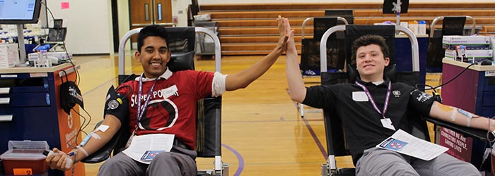 Ethan Thompson '20 and Theodore Casey '20 are proud to be giving blood.