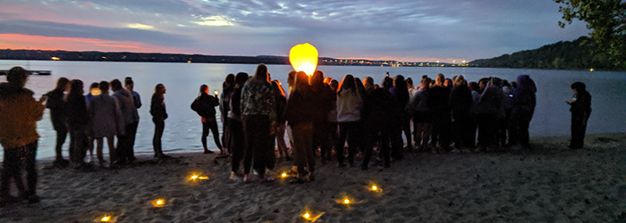 The girls released biodegradable Chinese lanterns, symbolizing things they want to let go of in the coming year.