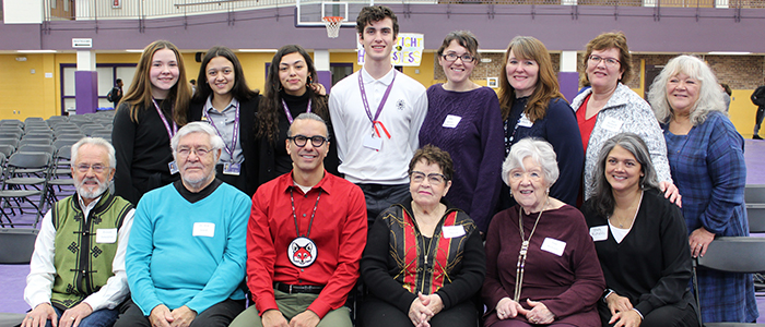 Dr. Anton Treuer (front center, in red) spoke to student about Native American history and culture.