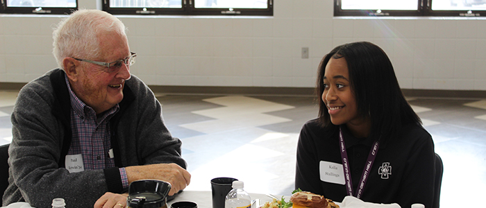Paul Kerwin '54 and Kalia Stallings '23 chatted during lunch.