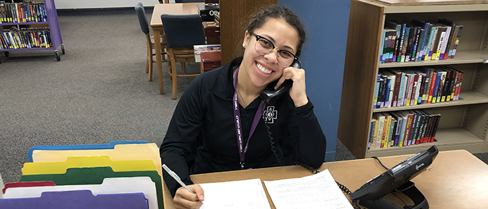 Juliana Cruz '22 is all smiles while she connects with alumni.