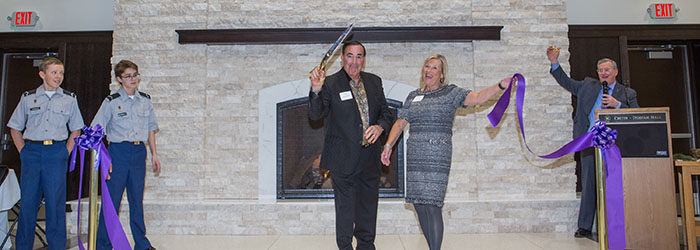 Tom and Debbie Lentsch cut the ribbon for the new Lentsch Forum.
