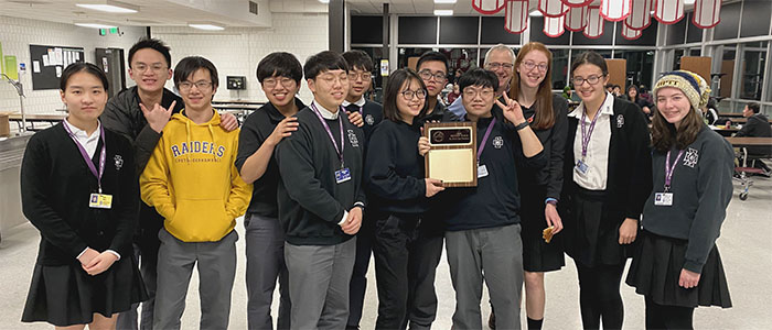 The math team poses with their award.