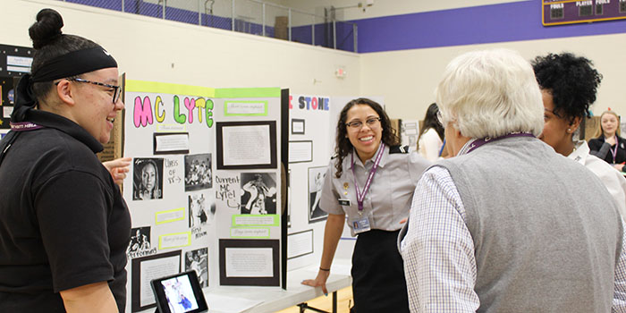 Three students presented their project to Brother Michael Rivers for judging.