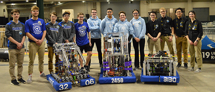 The Robotics team with their robots in Grand Forks.