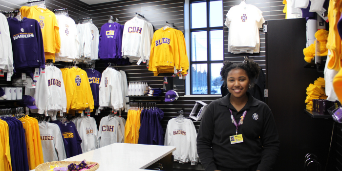 Nantale Bagurusi '21 working in the Raider Rack. Photo taken pre-COVID-19.