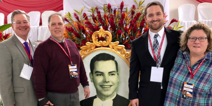 Lou Anne Tighe (right) attended the beatification of Blessed Brother James Miller in December 2019, along with President Frank Miley, Religion teacher Peter Gleich, and Learning Lab teacher Joe Miley '11.
