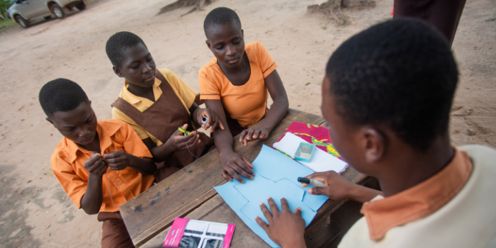 Students learn about menstrual hygiene and management while making reusable pads at a workshop in Ghana. Photo courtesy of The Pad Project.