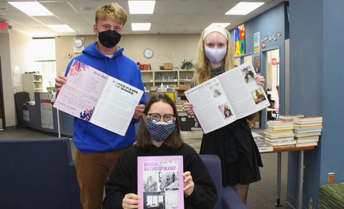 Theo Paar '21, Cecilia Shearon '21, and Alexandra Prodoehl '22 pose with the literary magazine.