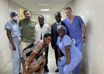 Shady Salamon '08, in the green shirt, traveled to Liberia on a medical mission.