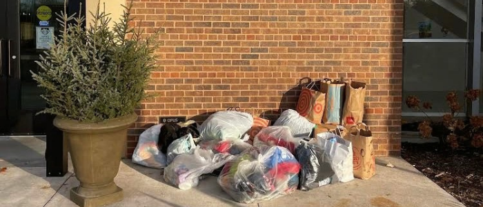 Raiders donated more than a dozen bags full of clothing and hygiene products.