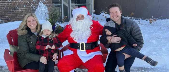 Pete Larson '04 brought his family to meet Santa.