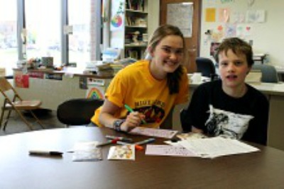 Annie Hendrix connects with Highland Friendship Club member.