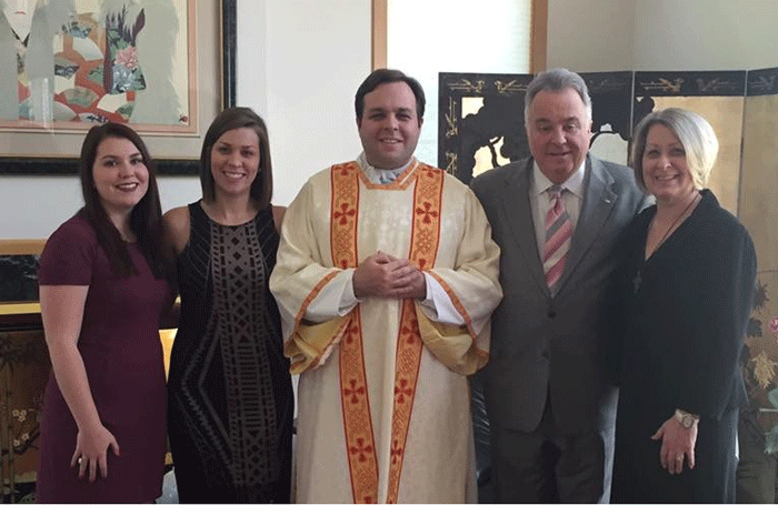 Deacon Paul Baker '05 and family.