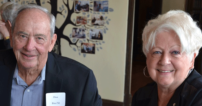 Don Bins'50, Betty Poehling, classmates and friends celebrate class lunch at CDH.