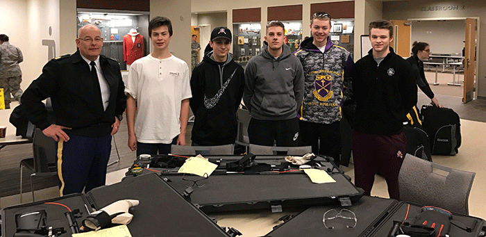 JROTC Rifle Team from Left to Right: SGM Berrisford, Bryce Bebey, Jonathan Koop, Jack Spencer, Jack Calkins, and Riley Domler