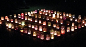 The women participated in a candle holder art project.