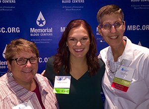 Suzanne Engel Zobitz'80 with Memorial Blood Center's Rachel Campbell (CDH Dance Team Coach), and Patty Murray stop for a quick photo at the appreciation breakfast.