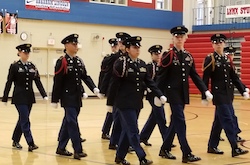 The drill team is given the command 