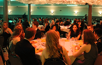 Students engage in conversation before the formal events of the evening