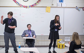 Students need to move during the school day, engaging bodies and mind. Here Spanish 300 students act out verbs as a method of vocabulary acquisition. Multiple Intelligences in action: Bodily Kinesthetic and Interpersonal.