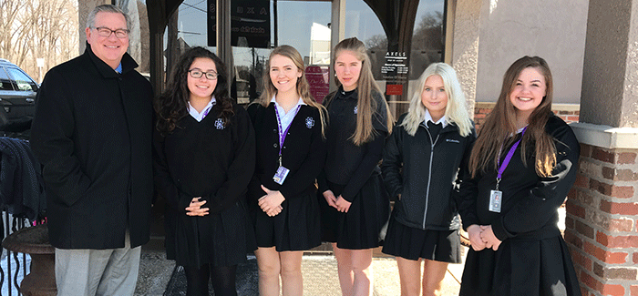 Pictured are (L-R) President Frank Miley, Alejandra Kelly '19, Mary Andrzejek '19, Eleanor Friar '20, Angie Thiry '18, and Julie Flowers '19.