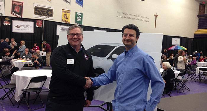 President Frank Miley with Car Raffle winner Dan Loftus.
