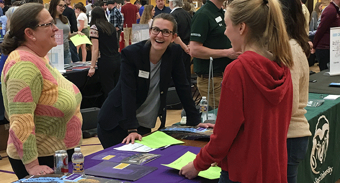 The College of the Holy Cross (MA) table featured alumni reps Deb Slipek, CDH parent, and Sarah Slipek '13, a Holy Cross graduate.