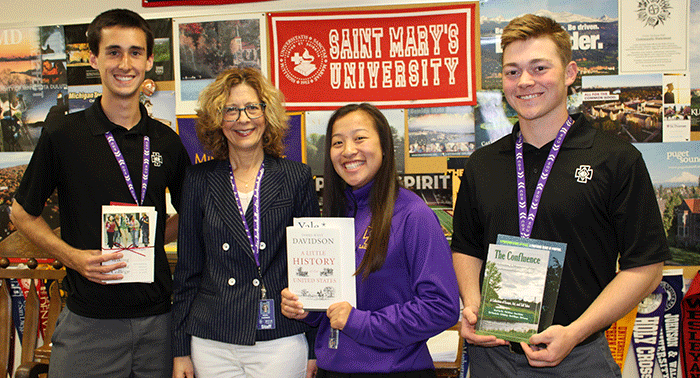Zach Muetzel, Principal Mona Passman, Anna Ankerstjerne, and Brian Williams