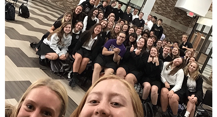 NHS co-presidents Abigail Reeder '19 and Emma Hamilton '19 take a selfie with the National Honor Society senior students.