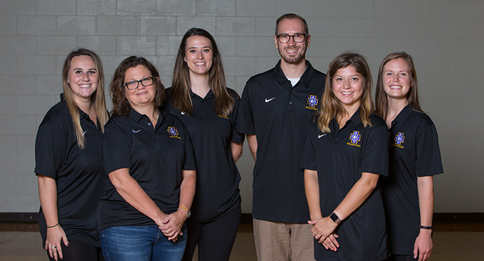 From L to R: Taylor Oppegard '13 (9 assistant coach), Ronda Gowan '82 (b-squad coach), Ellen Schafer '10 (head varsity coach), Nick Giles '03 (varsity assistant), Bridget Lasswell '13 (9A coach), Laura Hamilton '12 (9B coach). Not pictured: Hannah Gibbemeyer '14 (JV coach)