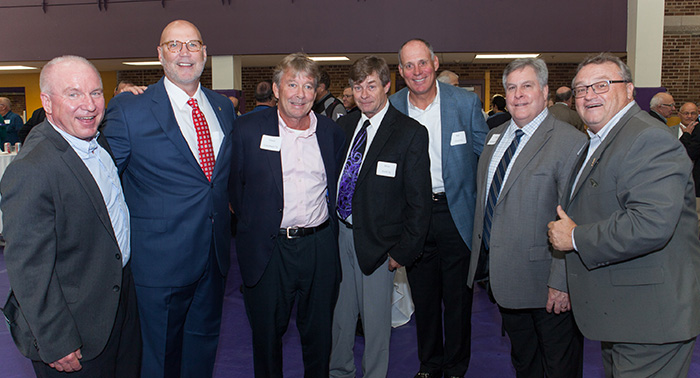 Keynote speaker Tom Gartland '75 (second from left) with classmates.