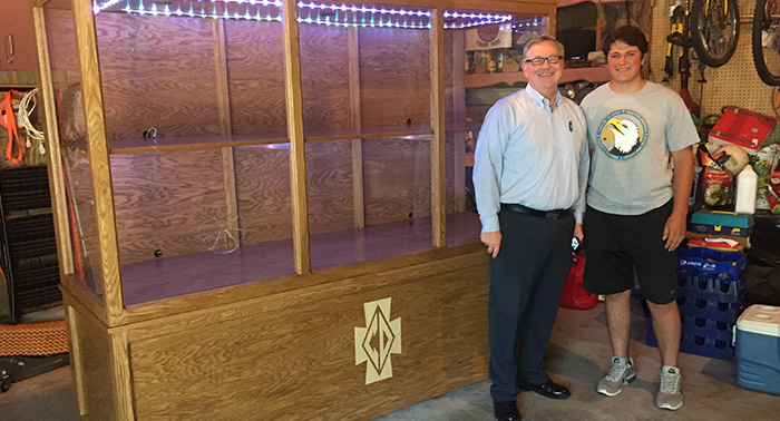 CDH President Frank Miley with Noah Peirson '19 and his Eagle Scout project - a handcrafted oak curio.