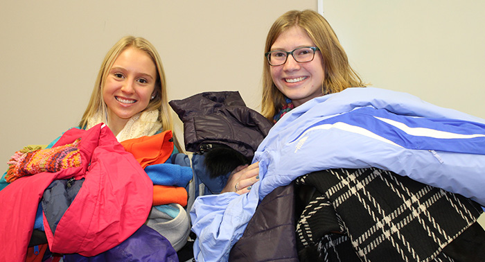 Abby and CeCe are overwhelmed by CDH’s generosity as they sort the donations.