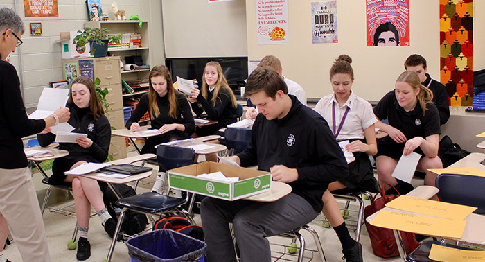 Members of the Service Committee read and sorted hundreds of holiday cards written by students and staff for US troops with a CDH connection.